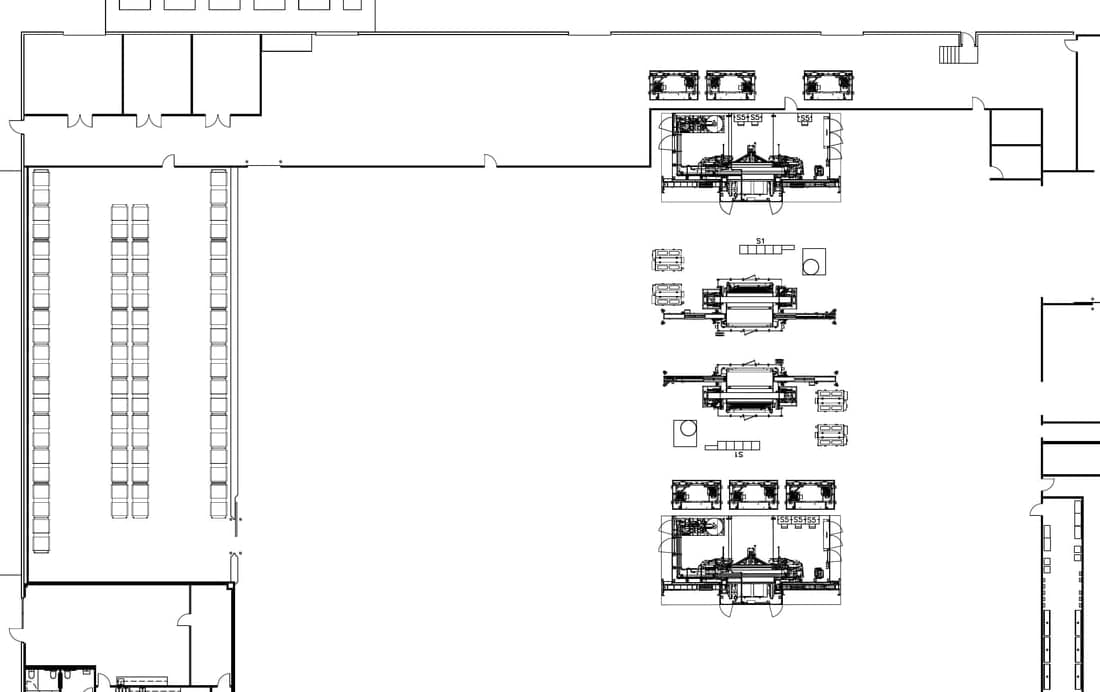Detail of a plant floor plan showing four process machines laid out against racking and walls
